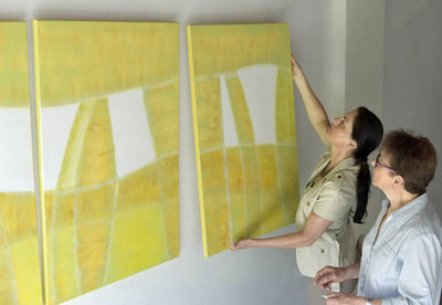 Josefaf Tscharmann, paintings of canvas, 3 artworks in yellow and white.